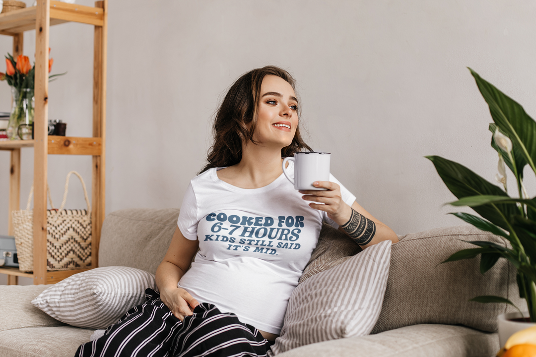 mockup-of-a-pregnant-woman-at-home-wearing-a-round-neck-tee-m12230-r-el2.png